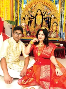 Community Gathers for Family-Hosted Durga Puja B