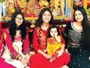 Community Gathers for Family-Hosted Durga Puja C