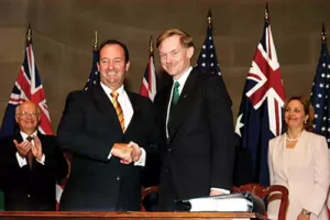 Minister for Trade, Mark Vaile (left) and United States trade representative Robert Zoellick (right) after signing the AUSFTA, Washington DC (2)a